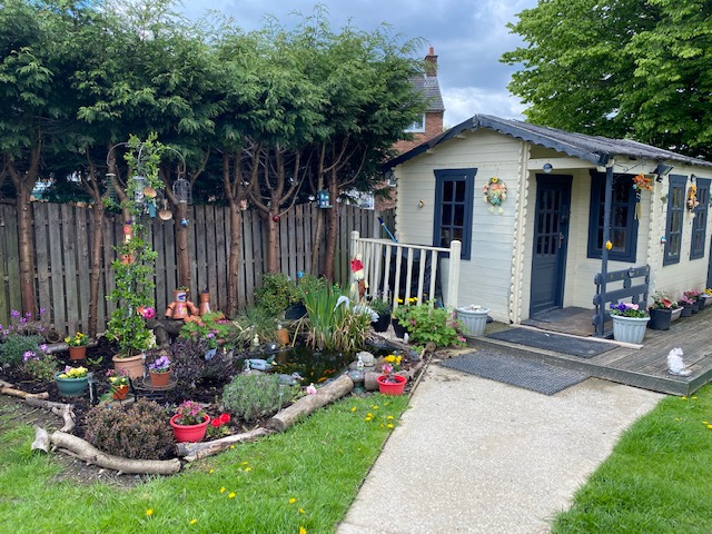 Flowerbed and shed